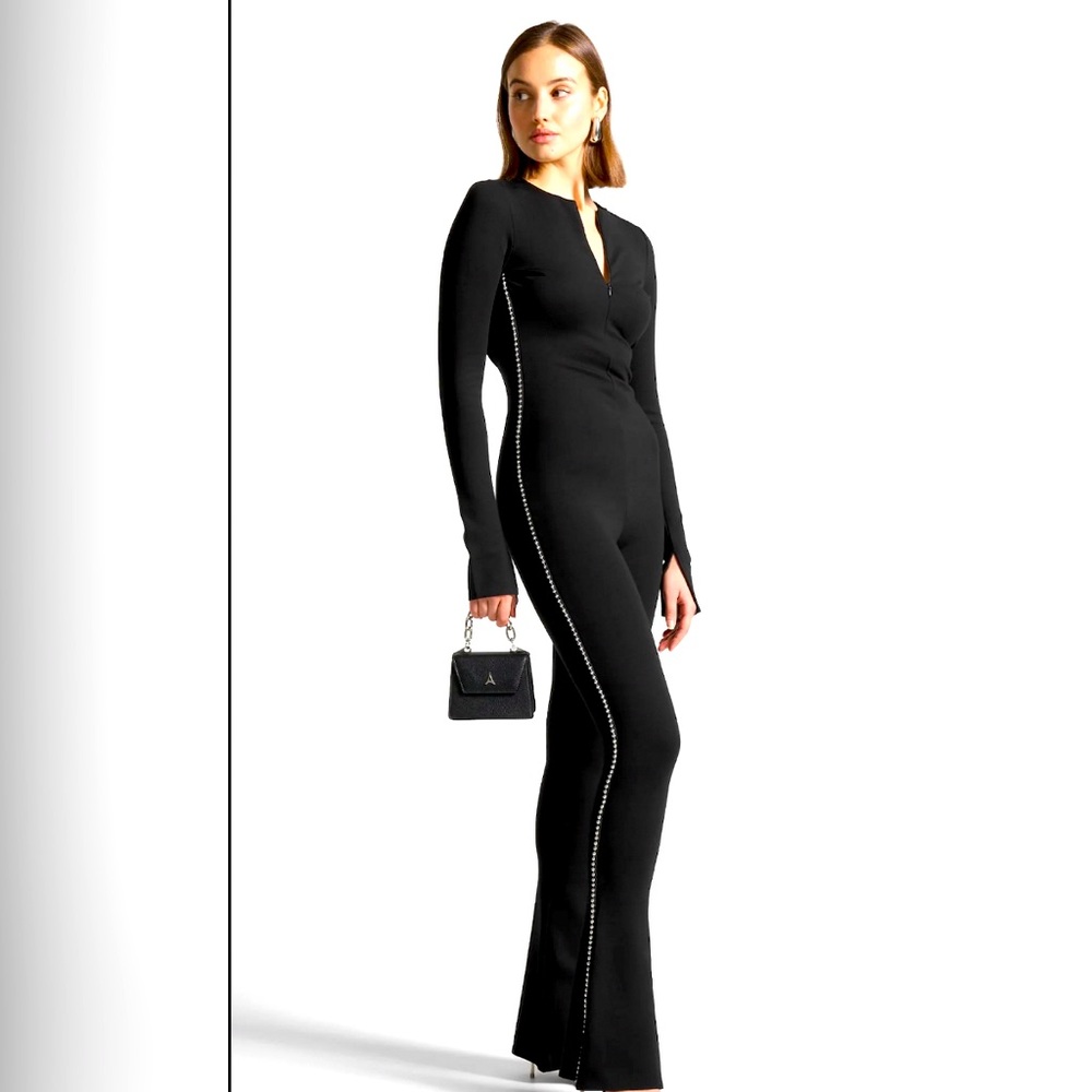 Manière Jumpsuit ! This is a great piece quality fit to the body! Only worn once